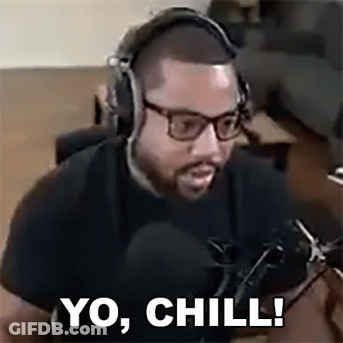 A Man With Glasses And Headphones Is Sitting In Front Of A Microphone And Saying `` Yo , Chill ! '' GIF