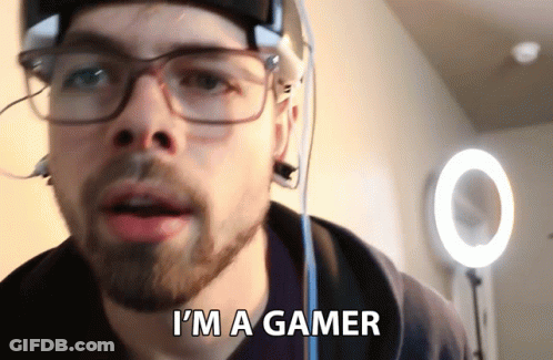 Man With Glasses And Headphones Saying I'm A Gamer GIF