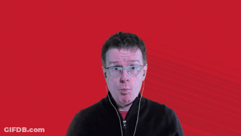 A Man With Glasses And Headphones Says Wow In Front Of A Striped Background GIF