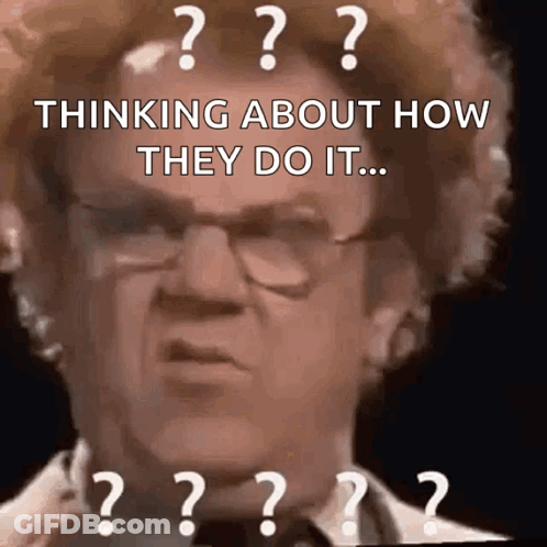 A Man With Glasses And Red Hair Is Thinking About How They Do It GIF