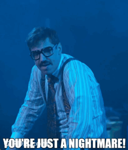 A Man With Glasses And Suspenders Says " You 'Re Just A Nightmare ! " GIF