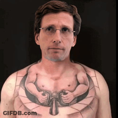 A Man With Glasses Has A Tattoo Of A Man 'S Chest GIF