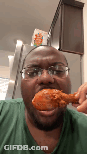 Man With Glasses Eating Chicken GIF