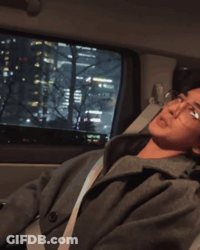 A Man With Glasses Is Giving A Thumbs Up GIF
