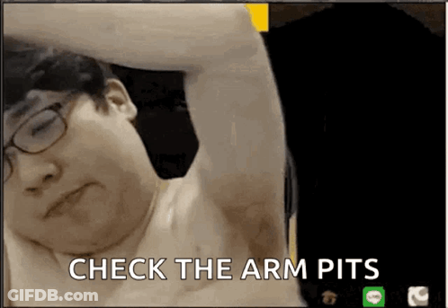 A Man With Glasses Is Laying Down And The Words Check The Arm Pits Are Visible GIF