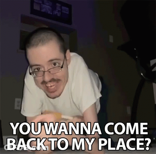 A Man With Glasses Is Laying On His Stomach With The Words " You Wanna Come Back To My Place " Above Him GIF