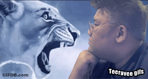 A Man With Glasses Is Looking At A Painting Of A Lion With The Words Teegravee Gifs Below Him GIF