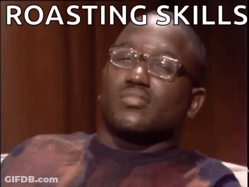 A Man With Glasses Is Making A Funny Face With The Words Roasting Skills Wack GIF
