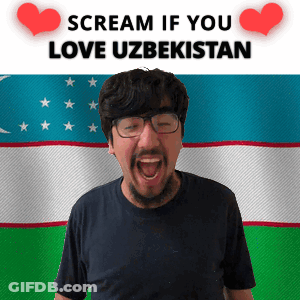 A Man With Glasses Is Screaming In Front Of An Uzbekistan Flag GIF
