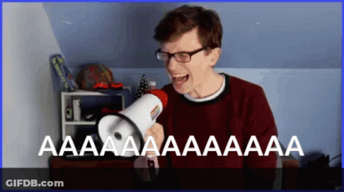 A Man With Glasses Is Screaming Into A Megaphone That Says Aa Aa Aa Aa Aa GIF