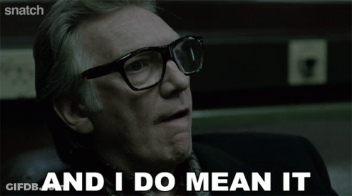A Man With Glasses Is Screaming With The Words " And I Do Mean It " Below Him GIF
