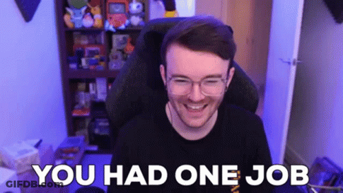 A Man With Glasses Is Sitting In A Chair With The Words `` You Had One Job '' Written On The Screen Behind Him . GIF