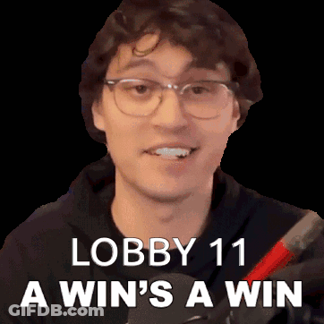 A Man With Glasses Is Smiling With The Words Lobby 11 A Win 'S A Win Below Him GIF