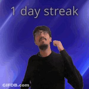 A Man With Glasses Is Standing In Front Of A Blue Background With The Words 1 Day Streak On It GIF
