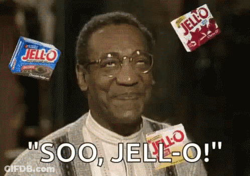 A Man With Glasses Is Surrounded By Boxes Of Jello And Says Soo , Jello-O ! GIF