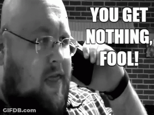 A Man With Glasses Is Talking On A Cell Phone With The Words You Get Nothing Fool Written Above Him GIF
