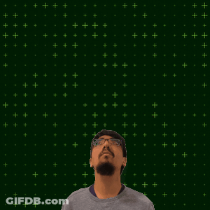 A Man With Glasses Looks Up At A Glowing Number 15 GIF
