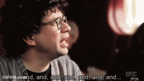 A Man With Glasses Says And And And And And And GIF