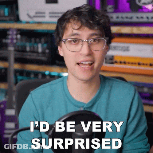 A Man With Glasses Says " I 'D Be Very Surprised " In Front Of A Microphone GIF