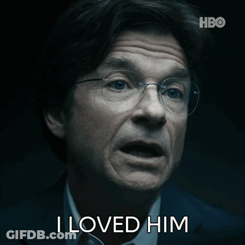 A Man With Glasses Says I Loved Him In A Dark Room GIF