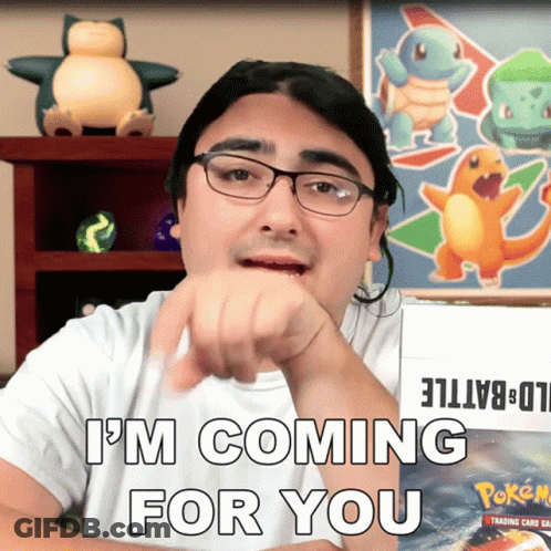 A Man With Glasses Says " I 'M Coming For You " In Front Of A Box Of Pokemon Cards GIF