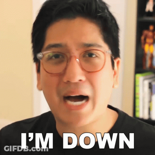 A Man With Glasses Says I 'M Down In Front Of His Face GIF