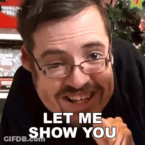 A Man With Glasses Says Let Me Show You GIF