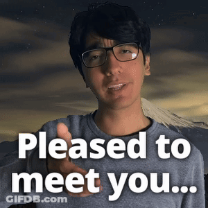 A Man With Glasses Says Pleased To Meet You With A Mountain In The Background GIF