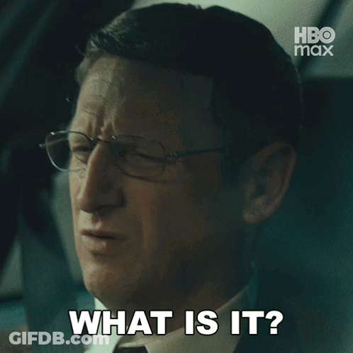 A Man With Glasses Says What Is It In Front Of A Hbo Max Logo GIF