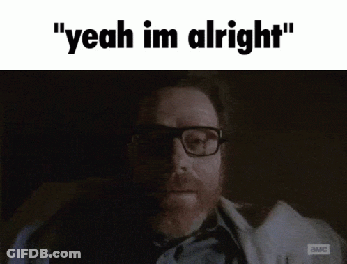 A Man With Glasses Says " Yeah Im Alright " In A Dark Room GIF
