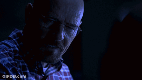 A Man With Glasses Says " You Got Me " In A Dark Room GIF