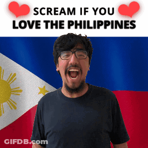 A Man With Glasses Screams In Front Of A Philippines Flag GIF