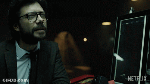 A Man With Glasses Sits In Front Of A Netflix Monitor GIF