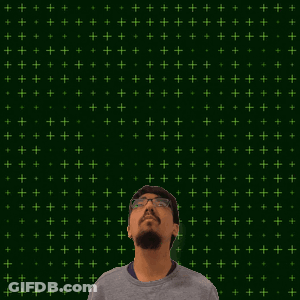 A Man With Glasses Stands In Front Of A Green Background That Says 1 + 15 On It GIF