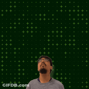 A Man With Glasses Stands In Front Of A Green Background With The Number 14 And 9 GIF