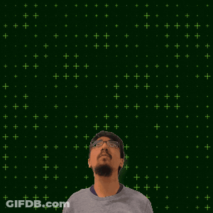 A Man With Glasses Stands In Front Of A Green Background With The Number 15 And 2 GIF