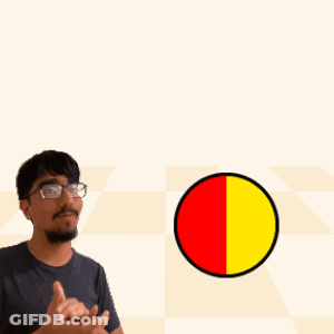 A Man With Glasses Stands In Front Of A Sign That Says Speedy + Graviton Speedygravi GIF