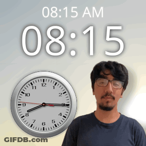 A Man With Glasses Stands In Front Of A Wall Clock That Says 08:15 Am GIF