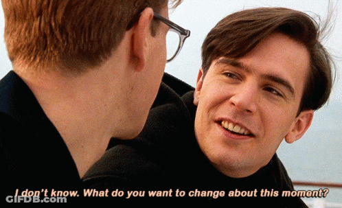 A Man With Glasses Talks To Another Man With The Words " I Don 'T Know What Do You Want To Change About This Moment " GIF