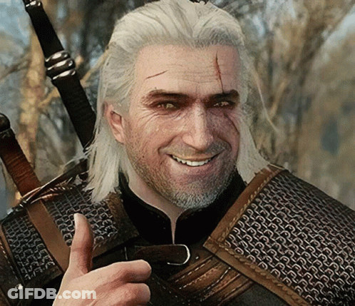 A Man With Gray Hair And A Beard Is Giving A Thumbs Up GIF