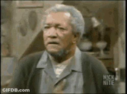 A Man With Gray Hair And A Beard Is Making A Funny Face In A Nick Nite Video . GIF