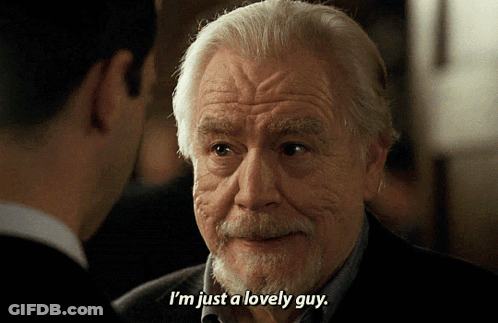 A Man With Gray Hair And A Beard Is Talking To Another Man And Says I 'M Just A Lovely Guy GIF