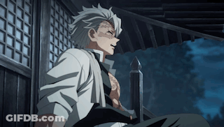 A Man With Gray Hair And A Tattoo On His Chest Is Sitting On A Porch . GIF