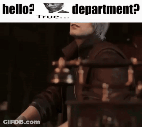 A Man With Gray Hair Is Sitting In Front Of A Sign That Says Department GIF