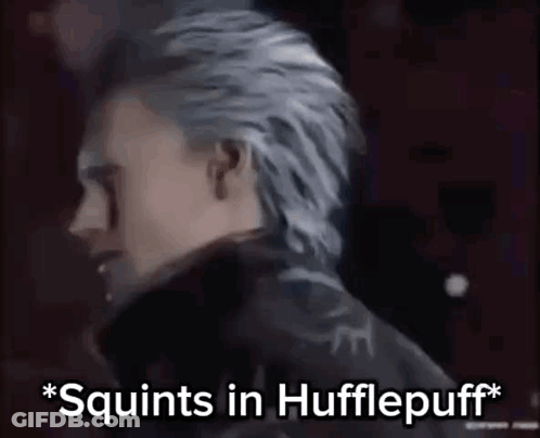 A Man With Gray Hair Is Standing In Front Of A Red Background And Says `` Squirts In Hufflepuff '' . GIF