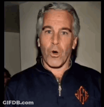 A Man With Gray Hair Is Wearing A Blue Jacket And Making A Surprised Face . GIF