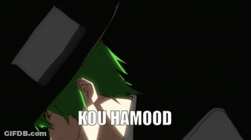 A Man With Green Hair Is Wearing A Black Hat And A White Shirt With The Words Kou Hamood Written On It GIF