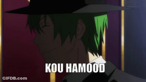 A Man With Green Hair Is Wearing A Black Hat And Has The Word Kou Hamood On His Chest GIF