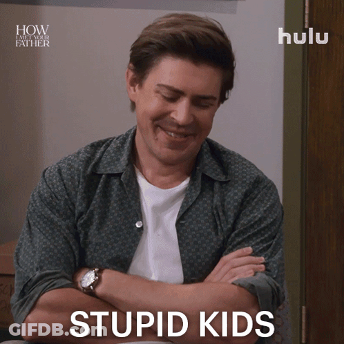 A Man With His Arms Crossed And The Words Stupid Kids On The Bottom GIF