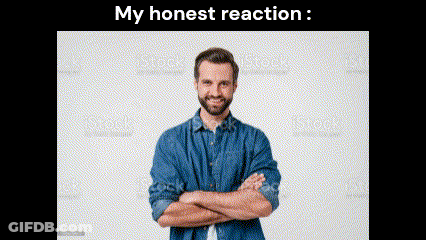 A Man With His Arms Crossed Is Smiling And Looking At The Camera . GIF